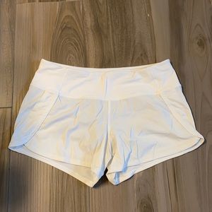 White women’s 4 inch mid-rise shorts size 6